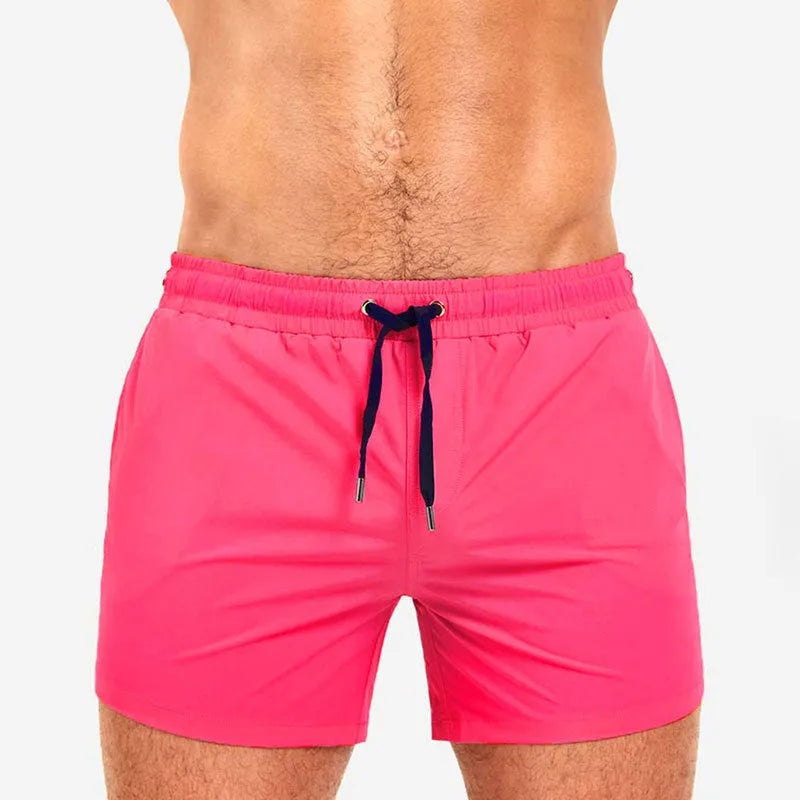 Man's mesh lining sports shorts in army green colour for swimming and fitness