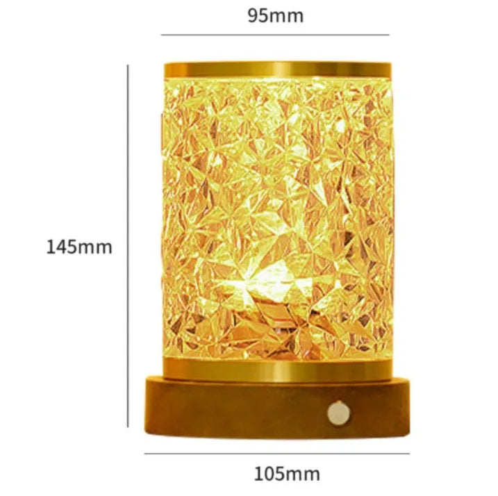 Rotating water ripple touch night light with acrylic body and solid wood base.