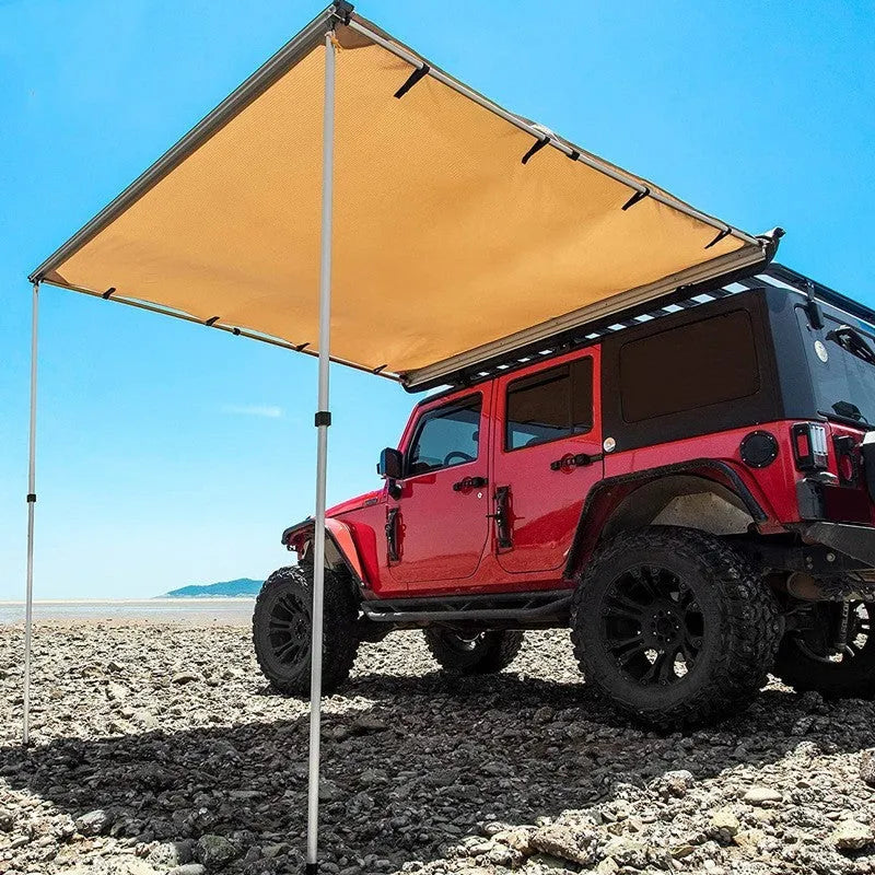 Black rainproof camping tent with aluminium poles set up outdoors, showing two-bedroom interior and Oxford cloth base.