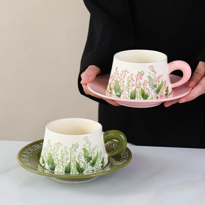 Ceramic coffee cup saucer set with two 300ml cups, saucers, and spoons in hanging bell design