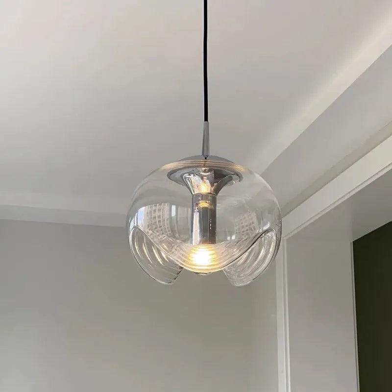 Modern minimalist glass bedside chandelier with a 250mm diameter, shown in a transparent light colour option.