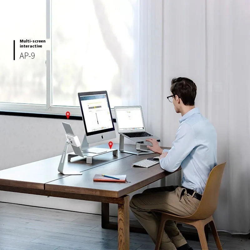 Black aluminium alloy laptop stand with 29.9 cm width on desktop