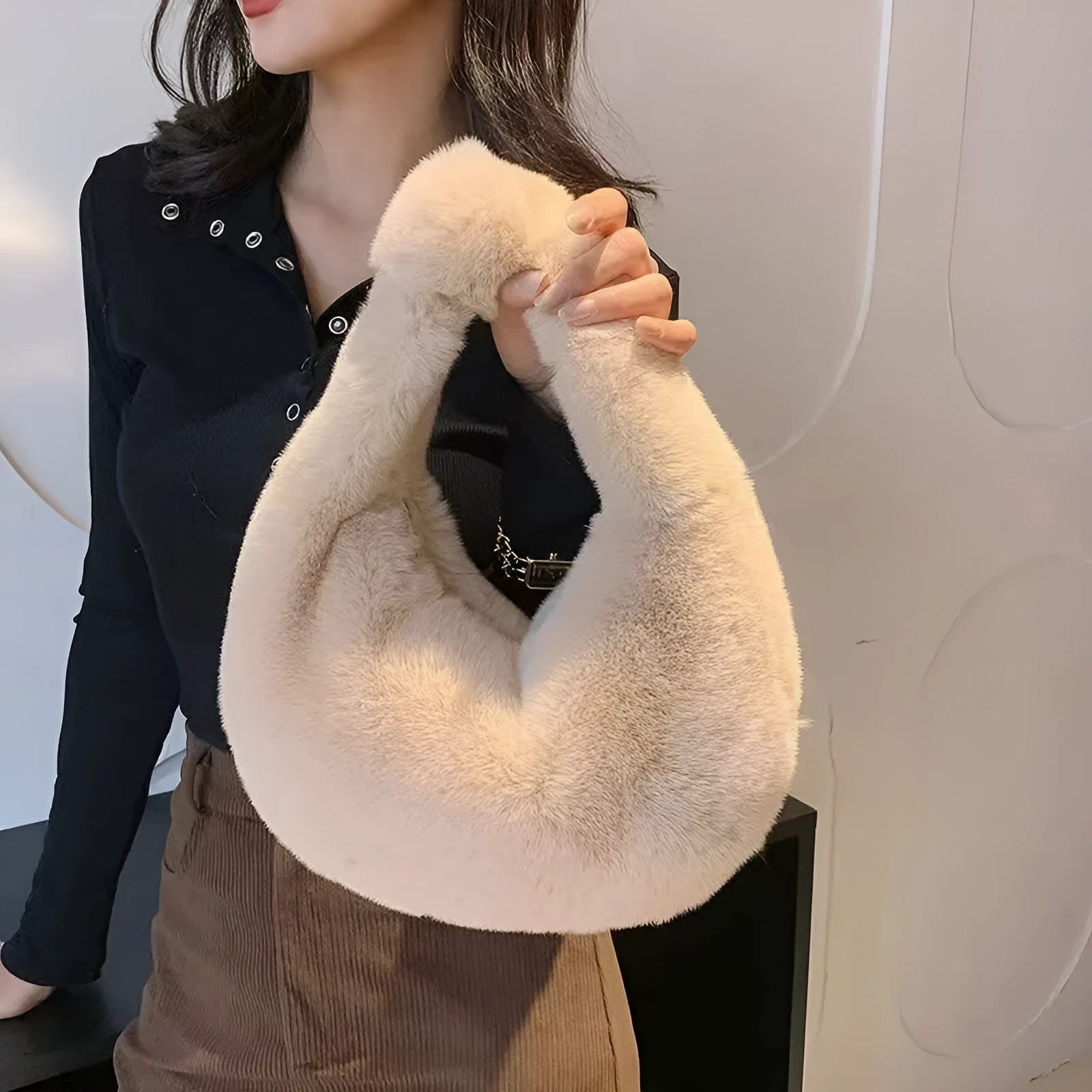 Plush dumpling bag in apricot colour, soft textured handheld handbag with polyester lining