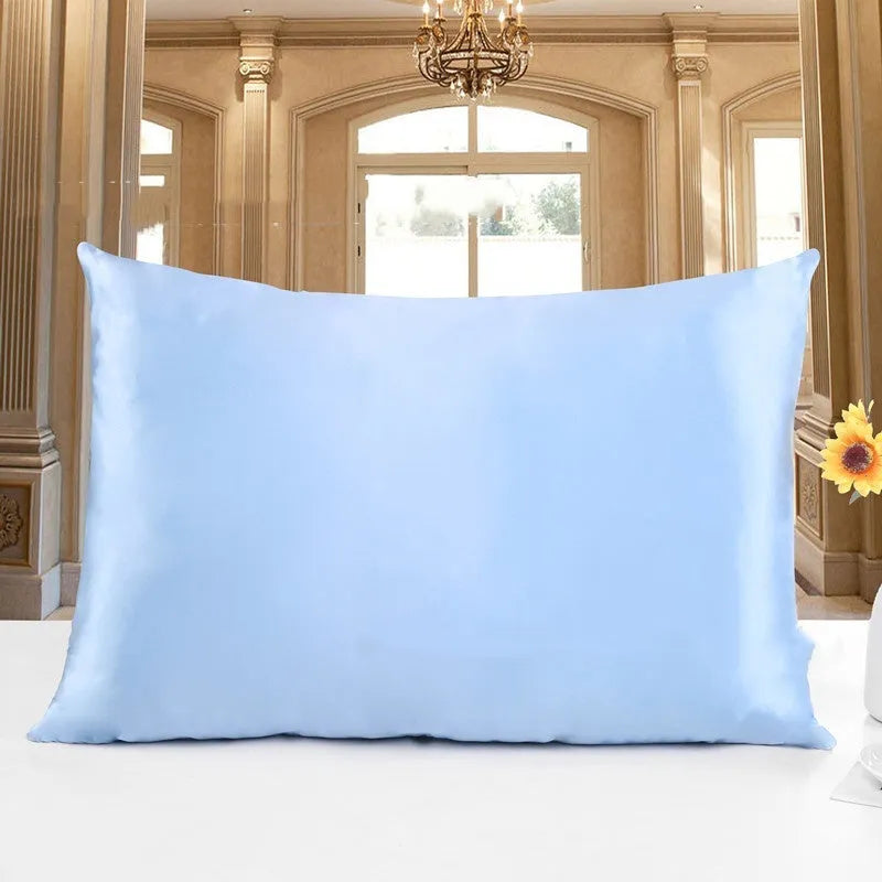 Double-sided 19 M silk pillowcase in apricot colour, showing smooth satin weave texture.