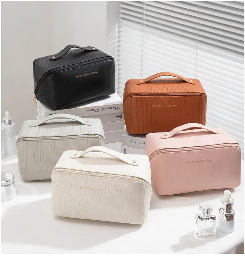 Vertical pattern pillow makeup bag in PU leather showing cubic shape and large storage capacity