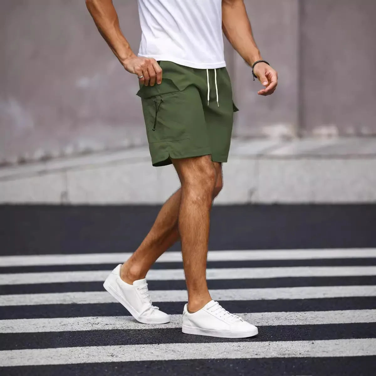 Men's loose fit workwear shorts in fluorescent green and army green colours with straight leg design