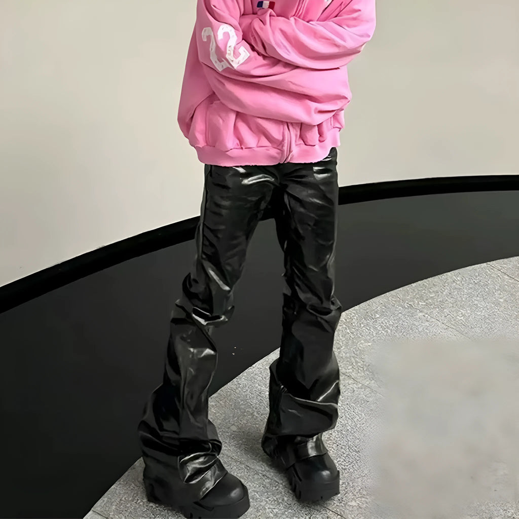 Black women's skinny jeans with a shiny patent leather-like coating and straight-leg fit