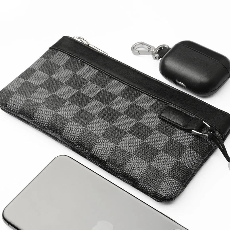 Black plaid patterned men's leather clutch wallet showing front view.