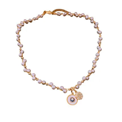 Women's gold electroplated round pendant necklace with zircon and imitation pearl on adjustable clavicle chain