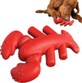 Red bone-shaped nylon chew toy for large aggressive chewing dogs on white background