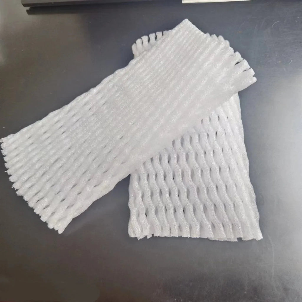 White foam net cover for fruit protection shown in various sizes on a table.
