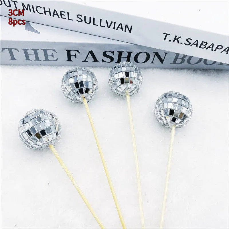 Glass disco ball cake decoration on wooden stick available in four sizes from 2.5cm to 5cm diameter