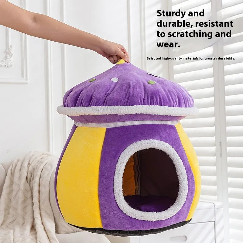 Grey mushroom-shaped plush cat bed with a detachable blanket, shown on a wooden floor.