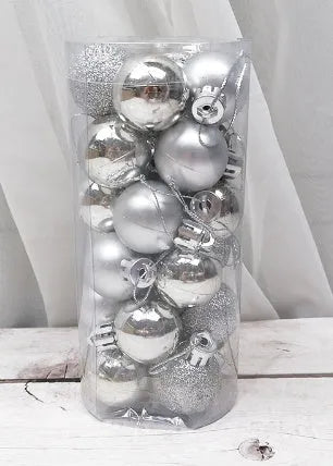 Assorted metallic gold, red, silver, and blue 3cm plastic Christmas bauble ornaments in a box.