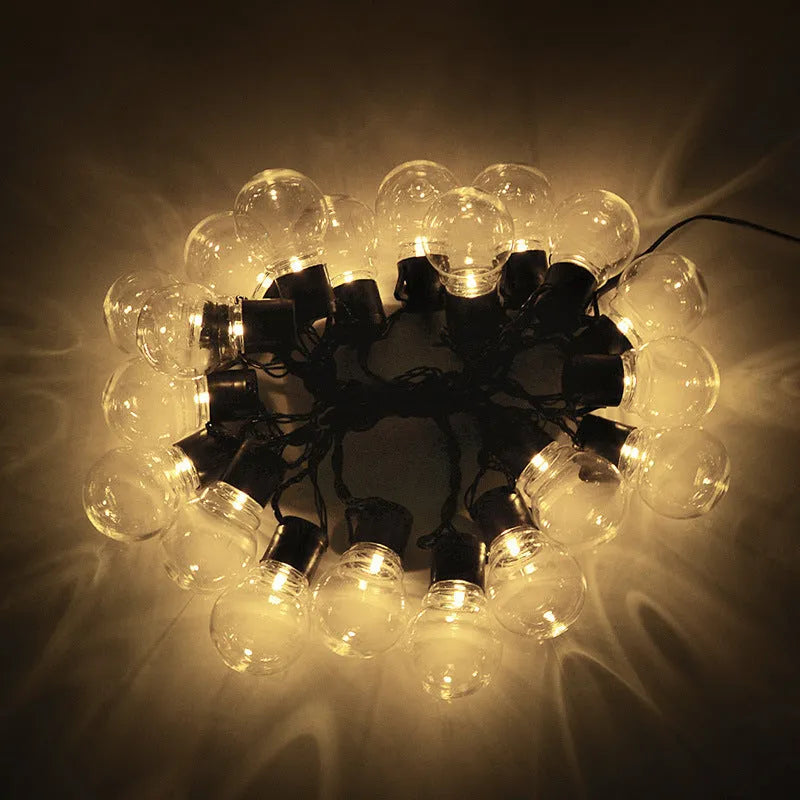 10 metre black wire solar festival lights with 40 warm white LED lamps and transparent ball covers