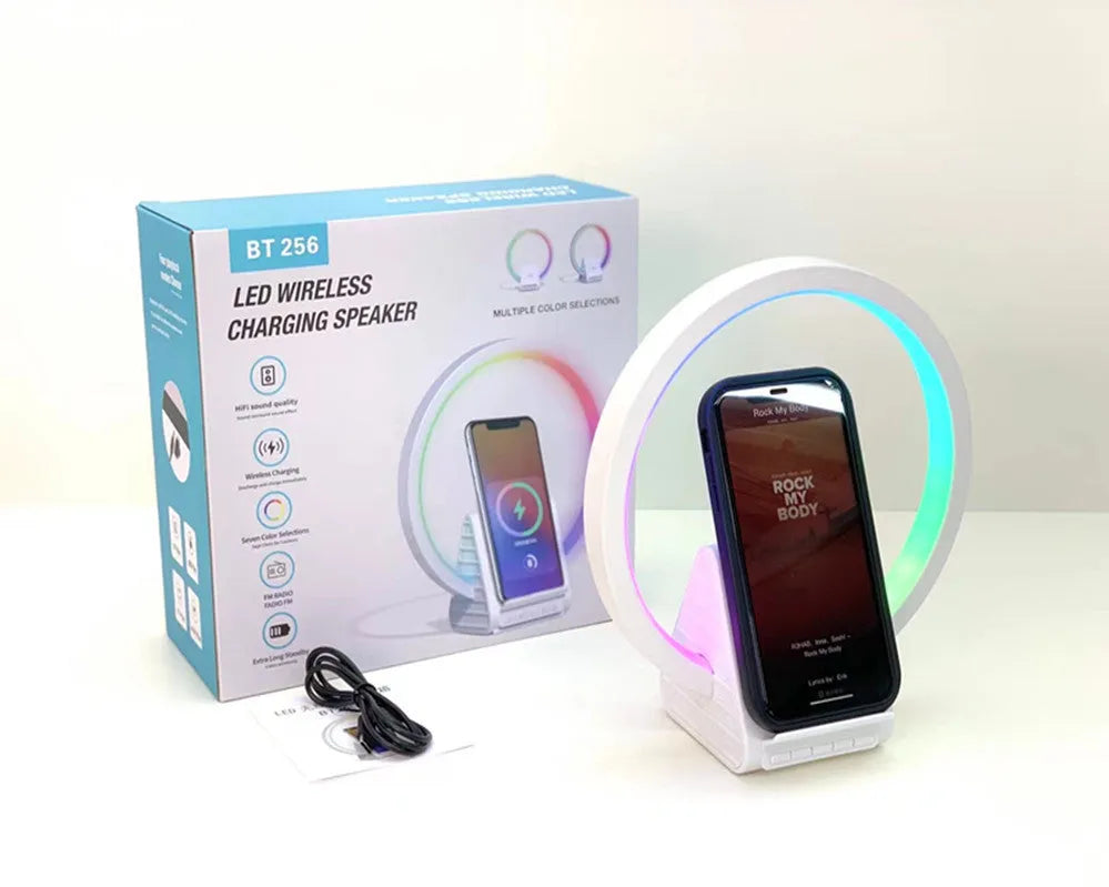 White rectangular Bluetooth speaker with wireless charging top and slim 10mm profile