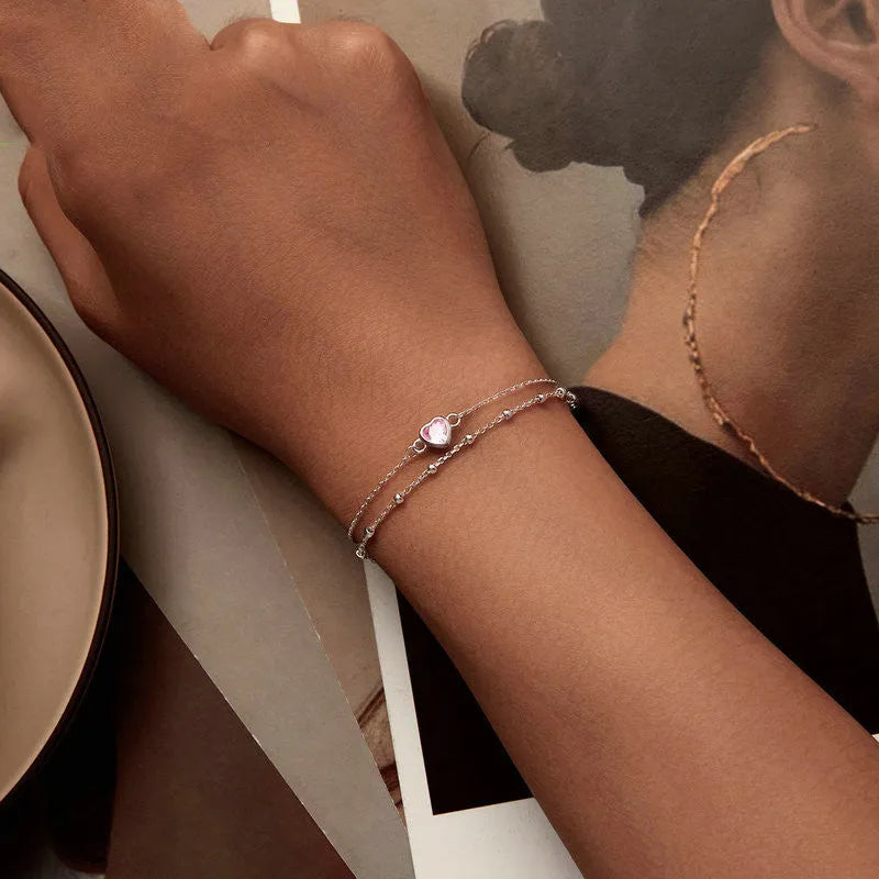 Sweet girlish style 925 sterling silver bracelet with a small heart pendant on an adjustable chain.