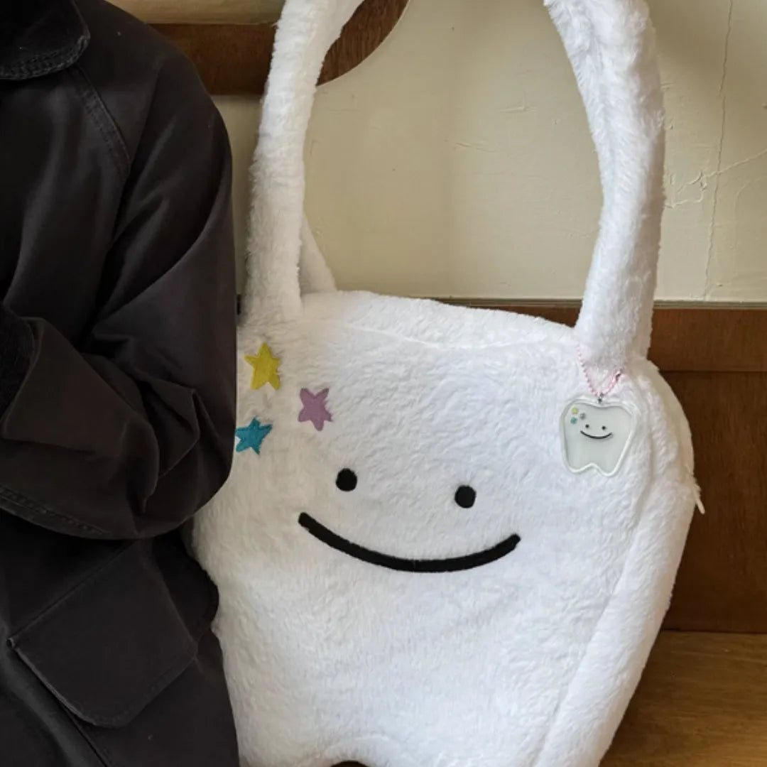 White plush shoulder tote bag with cute teeth pattern design and zipper closure