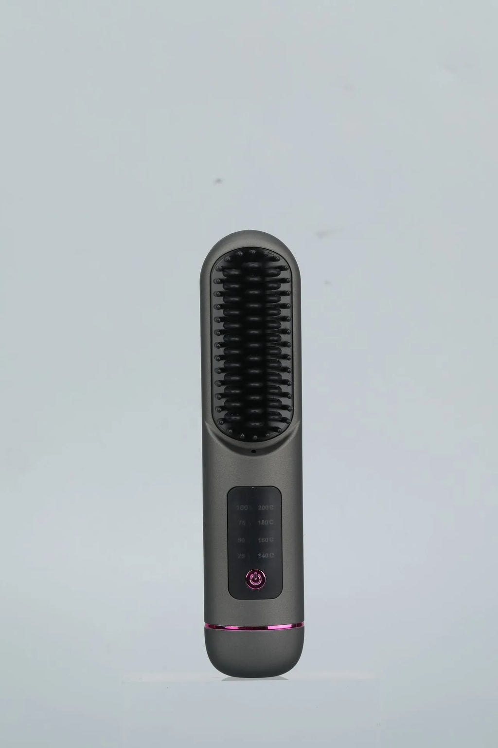 White portable negative ion hair comb with rechargeable battery on a plain background.