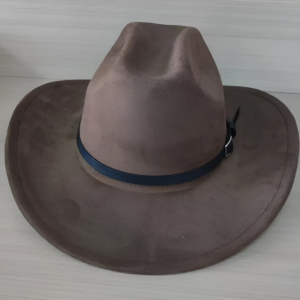 Brown leather velvet Western cowboy hat with a curved edge brim and conical crown.