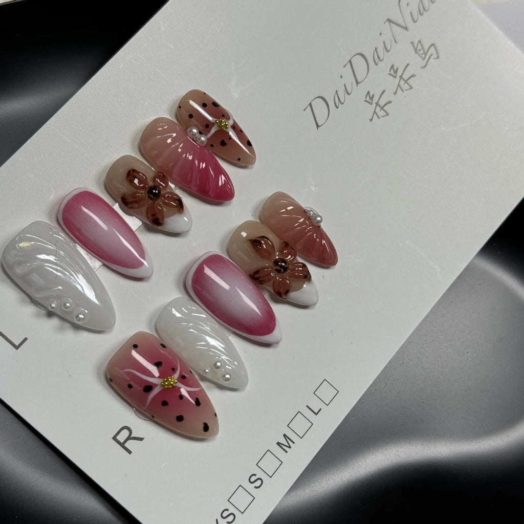 Three-dimensional embossed candy pattern nail art patches in almond shape with retro French styling