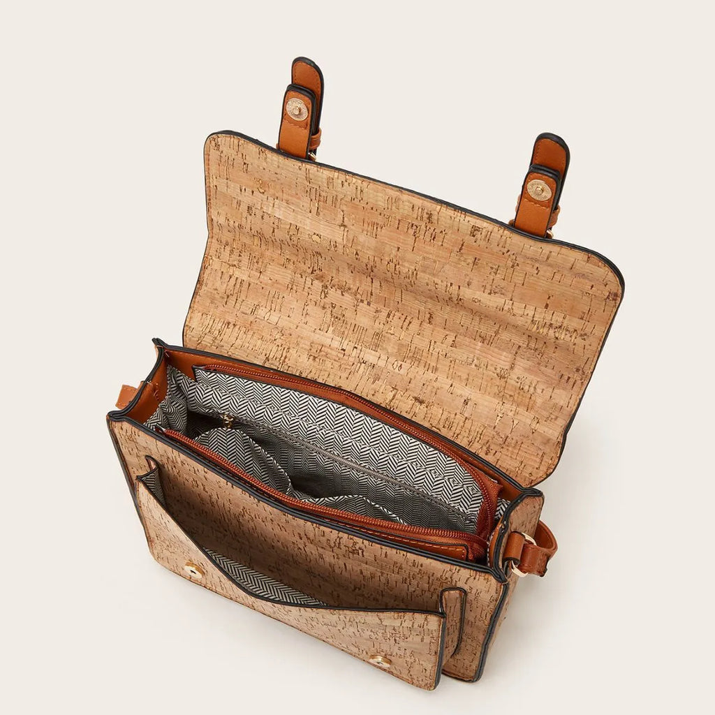 Women's printed PU crossbody bag showing large capacity and one shoulder strap