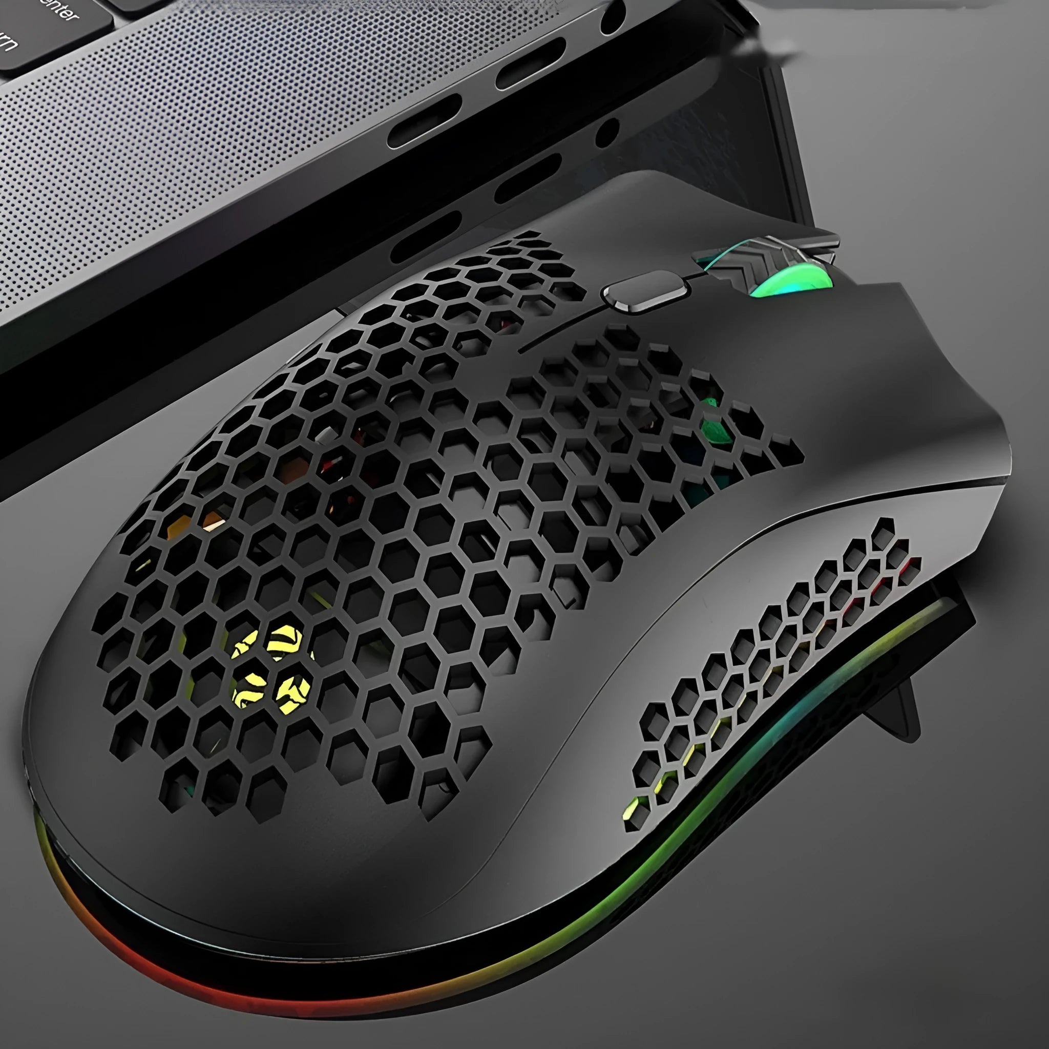 BM600 wireless optical computer mouse with hollow-out luminous shell in cyan, black, or white.