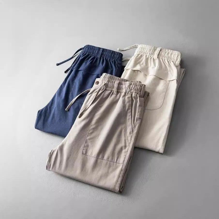 Men's solid colour linen trousers in mid waist design available in three colour options