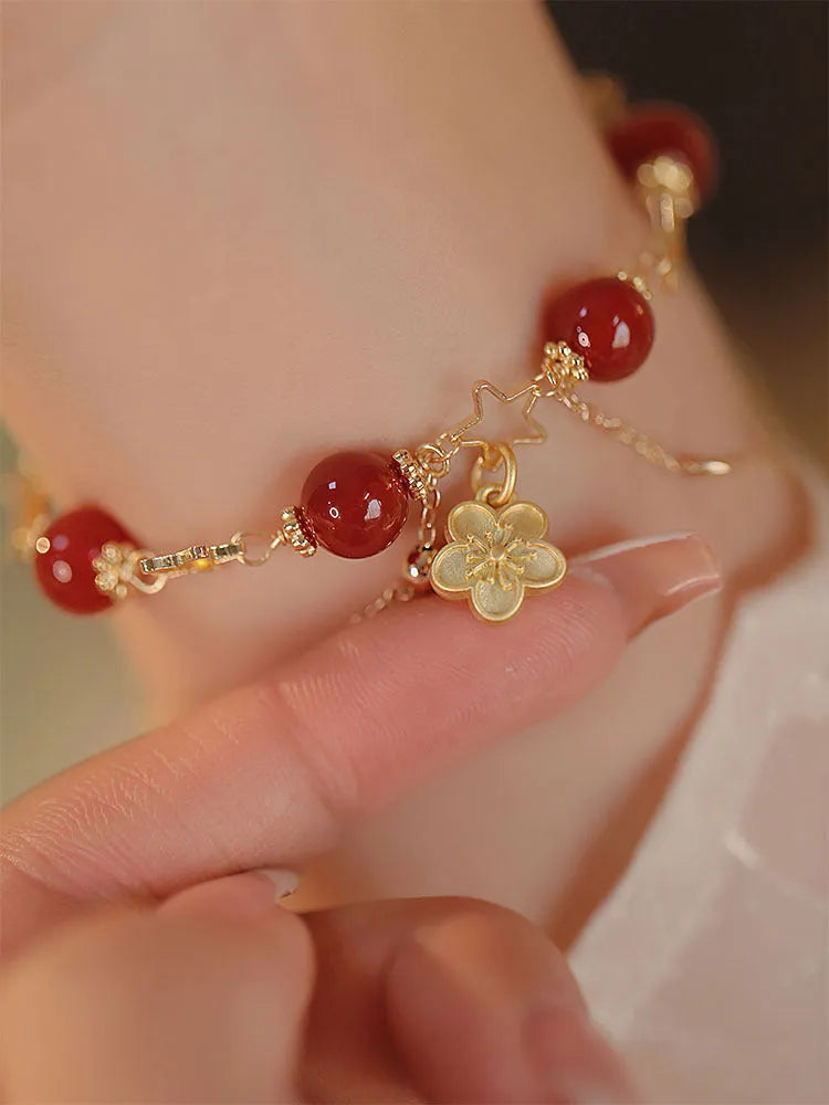Women's double layer bracelet with natural red agate and peach blossom floral design in red colour