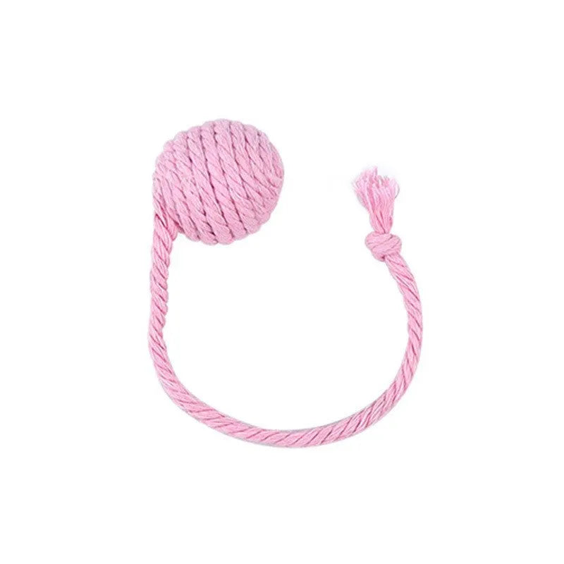 Cat toy ball with attached rope and bell in green, pink, purple or yellow colours showing 6cm and 3cm size comparison