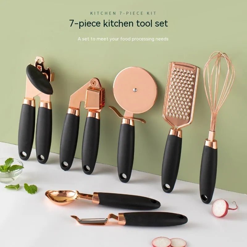 7-piece stainless steel kitchen tool set with copper plating peeler gadget in a cutlery rack on a countertop