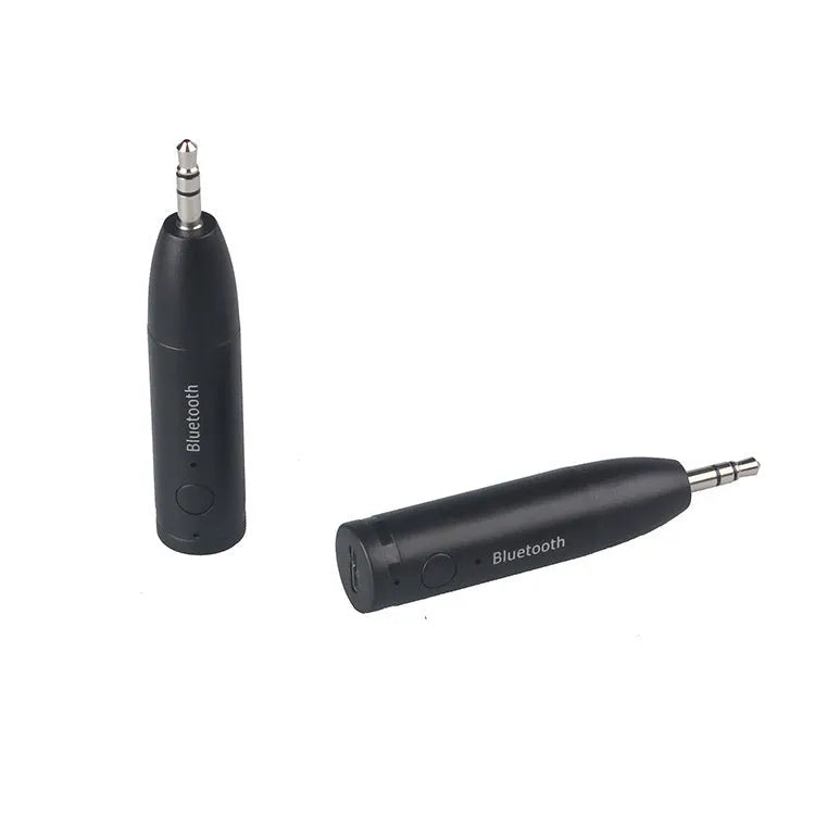 Black car Bluetooth audio receiver with USB cable for wireless music streaming to AUX stereo systems
