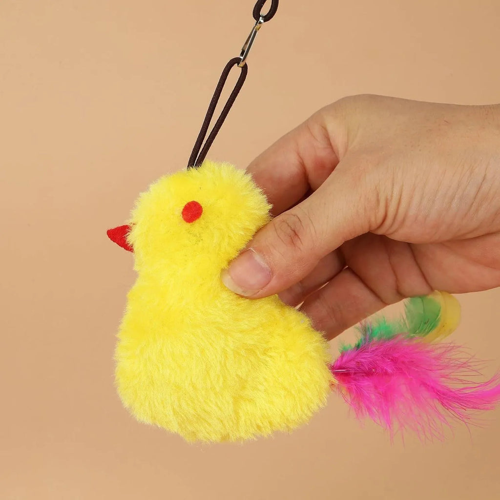 Interactive cat toy with elastic cord, dangling mouse and chicken toys, and treat dispenser bulb