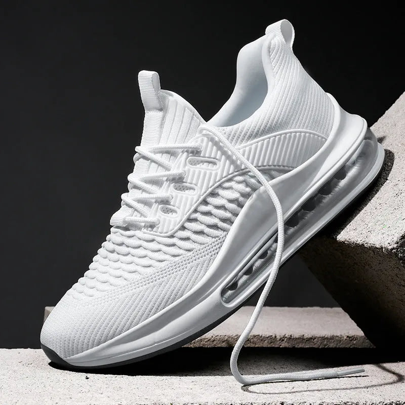 Men's solid colour mesh running sneakers with a round toe and lace-up front on a rubber sole.