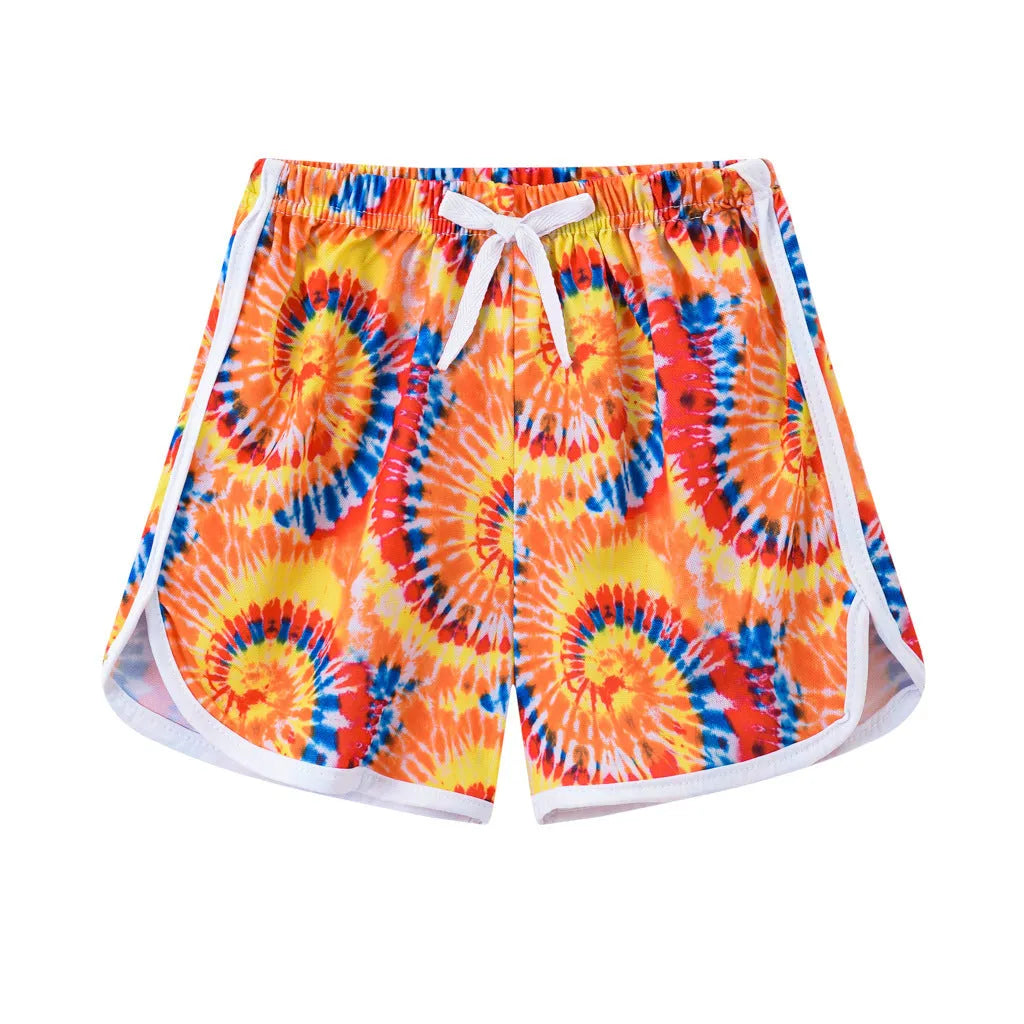 Children's casual polyester shorts in assorted colours and prints like pineapple, kitten, and stripes for beach wear.