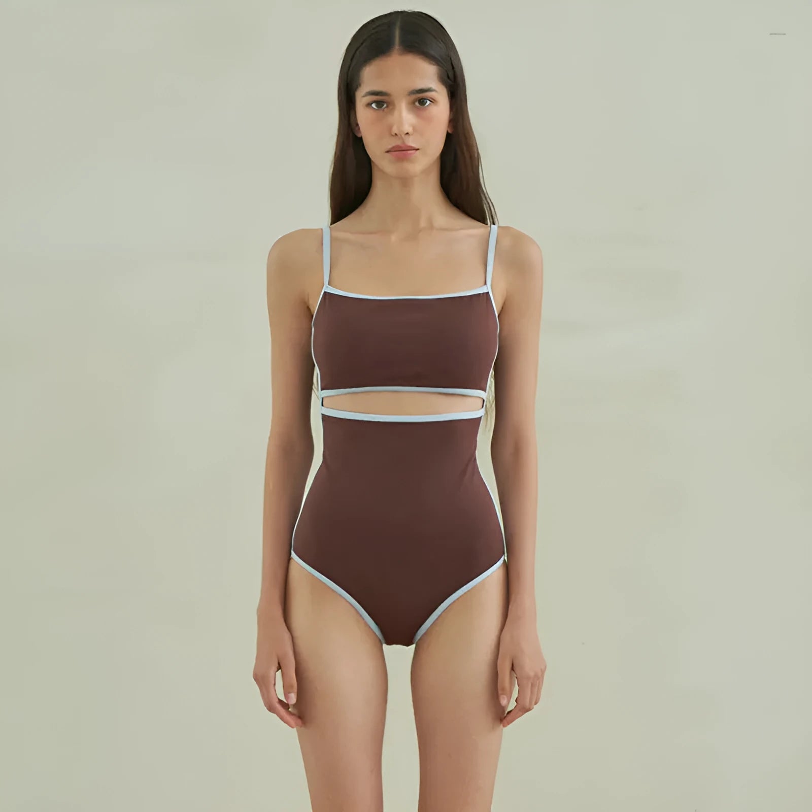 Brown triangle-style one-piece swimsuit for women on a mannequin.