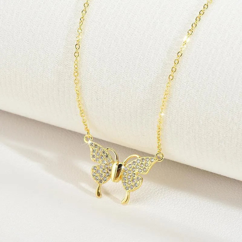 Gold titanium steel butterfly necklace with magnetic clasp and twisted chain