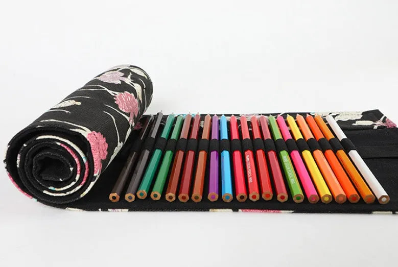 Square canvas pencil case with ballet girl print, showing elastic loops inside for organising pencils.
