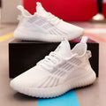 Men's white breathable flying fabric sports shoes with mesh lining and a low-platform sole.