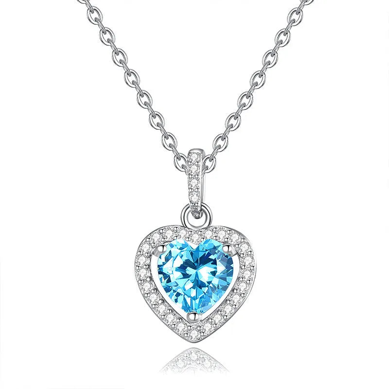 Women's sterling silver heart pendant necklace with natural coloured gemstone on cross chain
