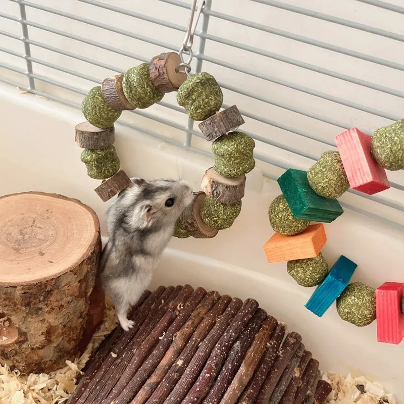Hamster chew toy with applewood stick and decorative straw ball ring for small pets