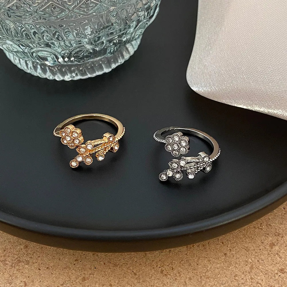 Women's copper open ring with diamond-treated flower and leaf design in gold or white colour