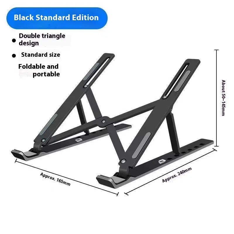 Silver aluminium alloy folding laptop stand with black silicone pads on a wooden desk.