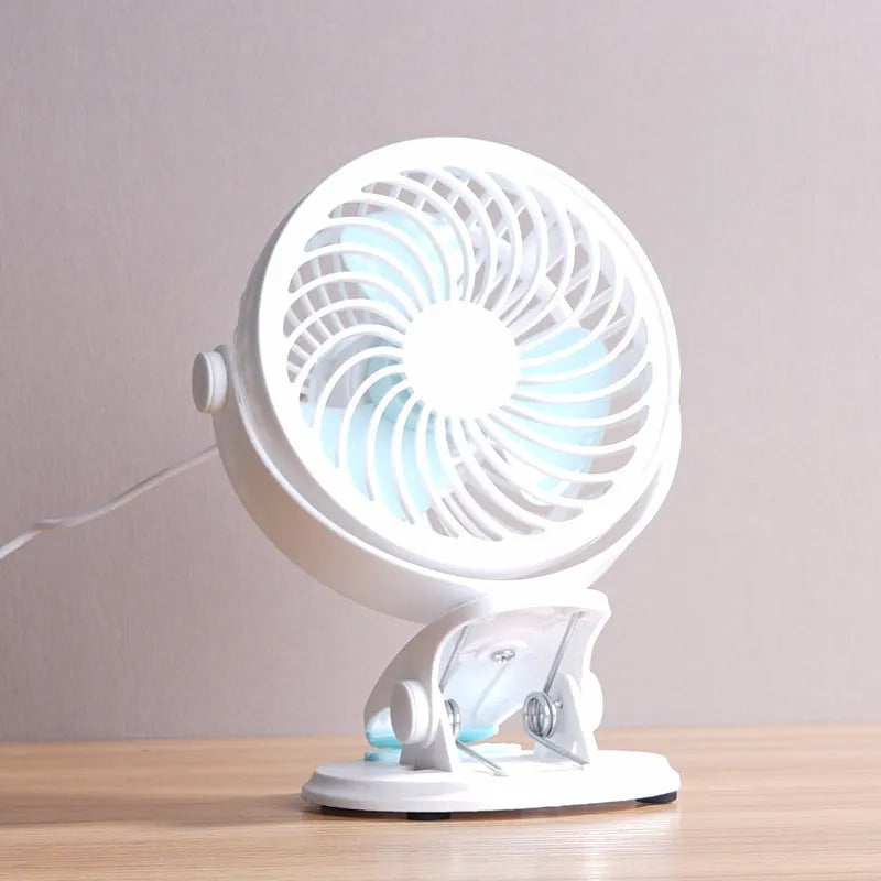 Compact USB desk fan with three blades and brushless motor for quiet operation below 36dB