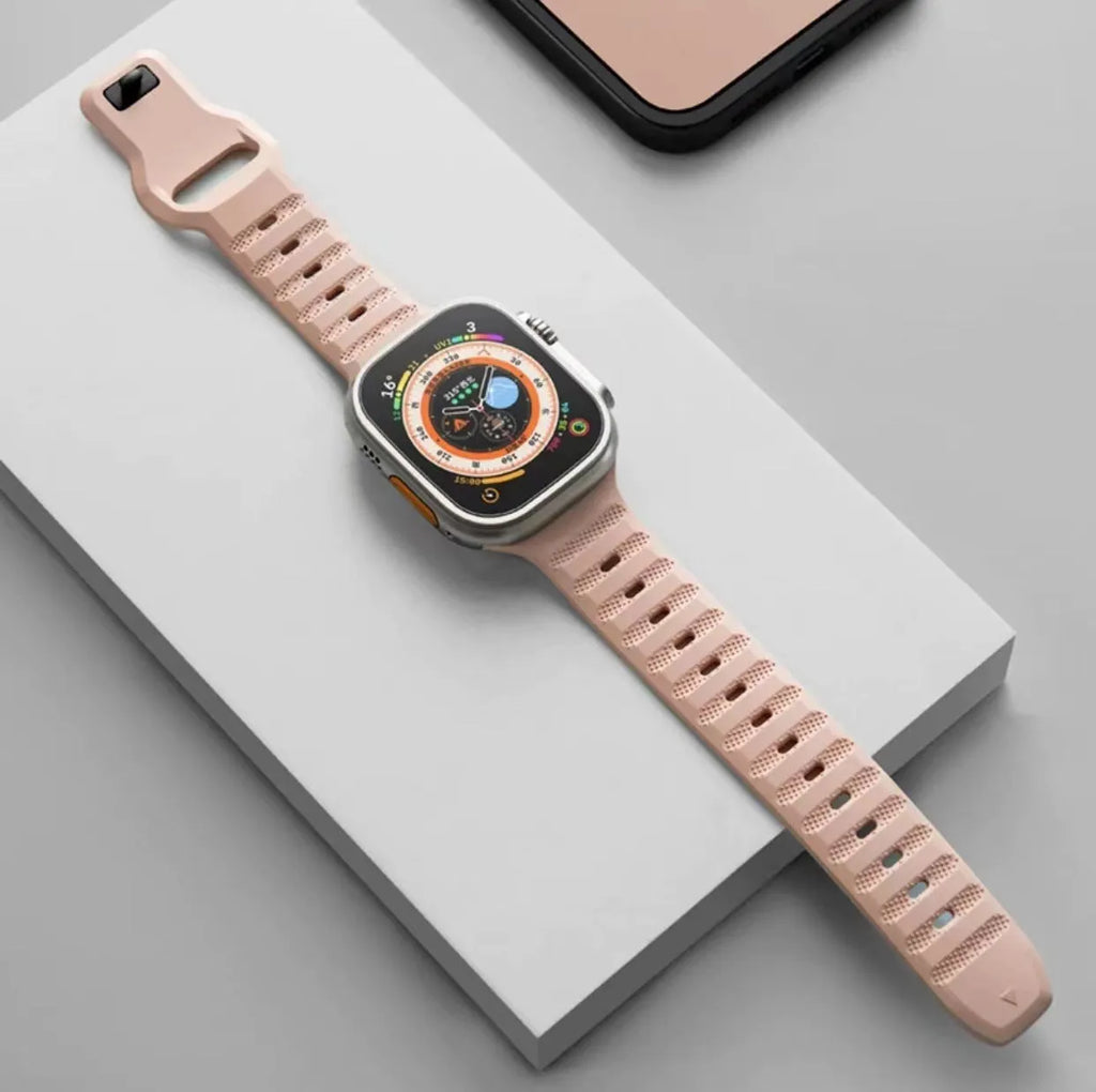 Fluoro rubber Apple Watch replacement strap with T buckle in black, blue, grey, orange, pink, or starlight.