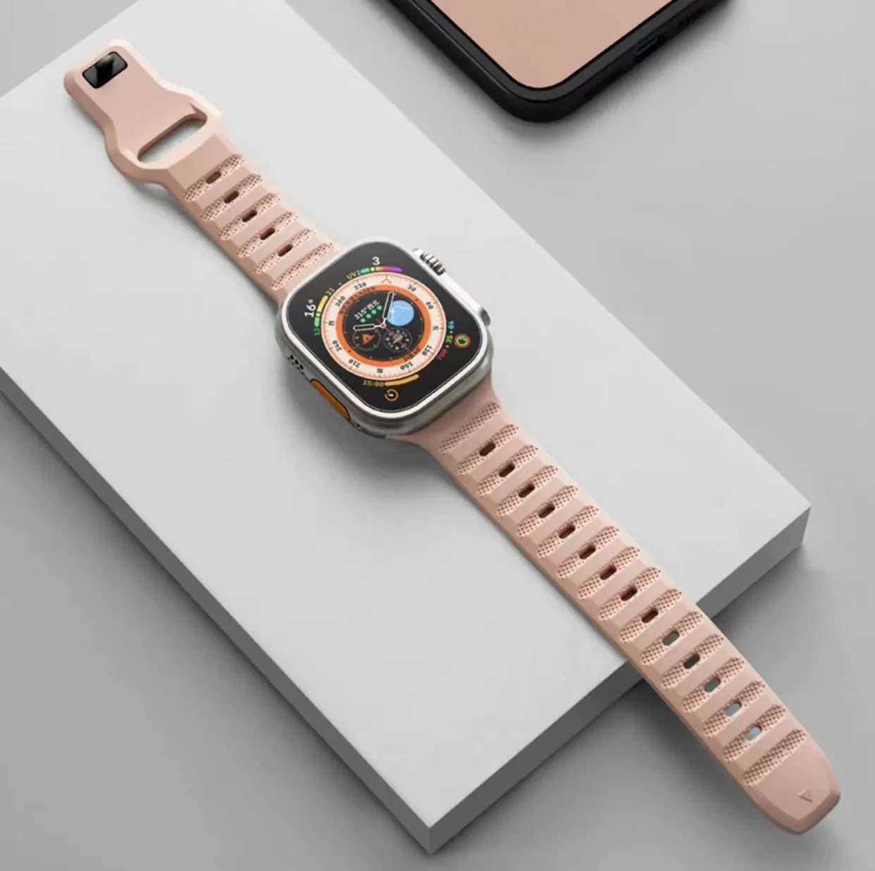 Fluoro rubber Apple Watch replacement strap with T buckle in black, blue, grey, orange, pink, or starlight.