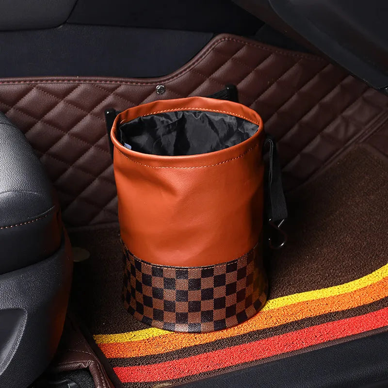 Retractable leather interior car trash can with handle shown in vehicle