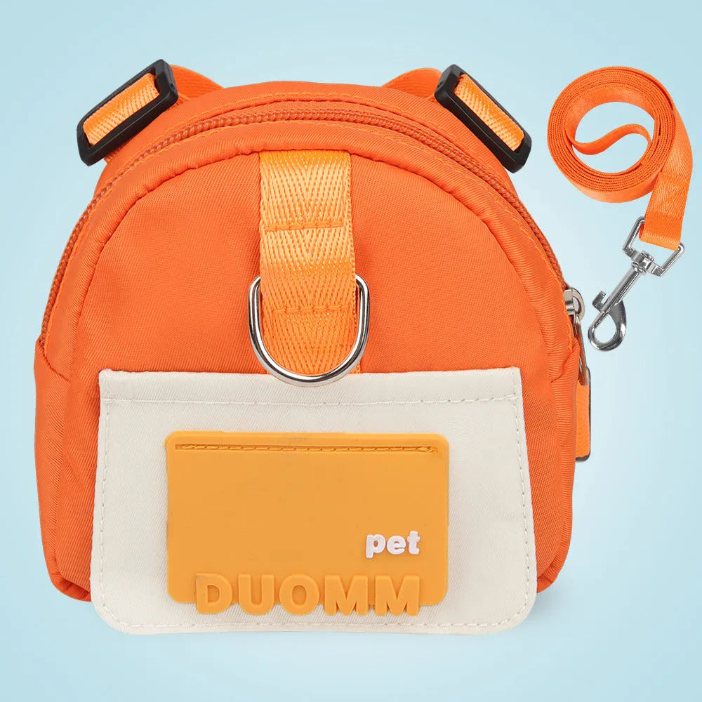 Blue adjustable dog harness with integrated backpack and attached tow rope on a medium-sized dog