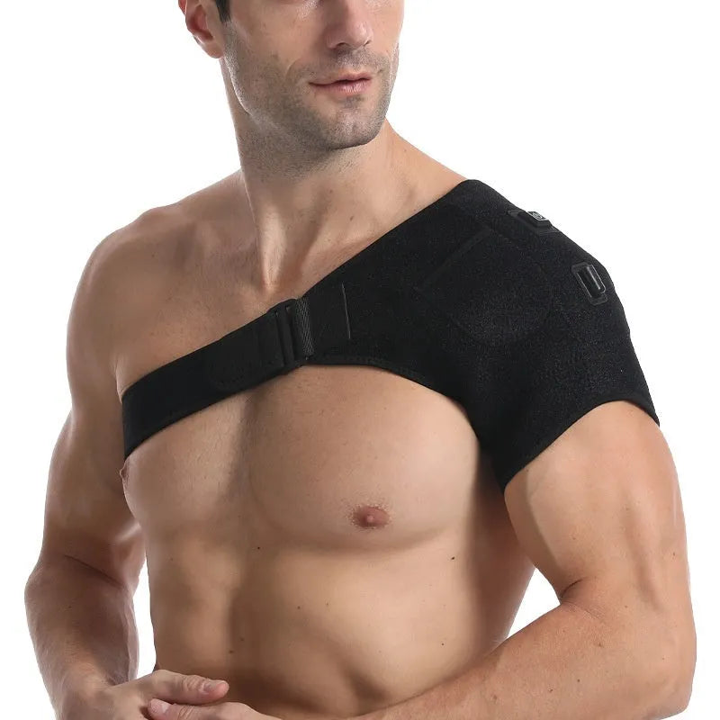 USB electric heating shoulder pad draped over a chair, showing its fabric construction and USB cable.