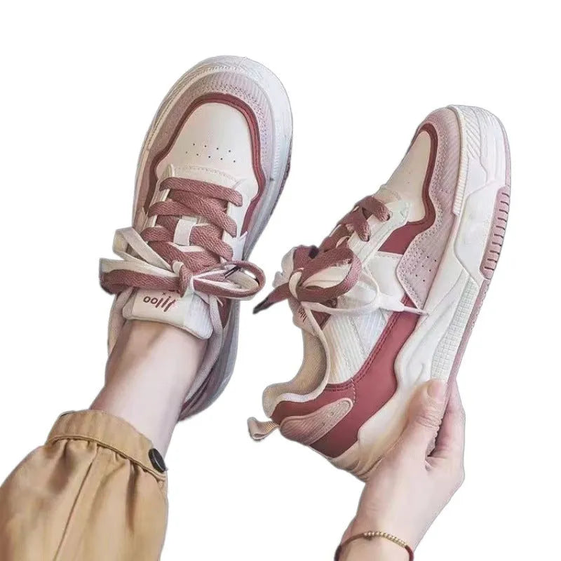 Women's low-top rubber sole sneakers in pink and white with height increase function